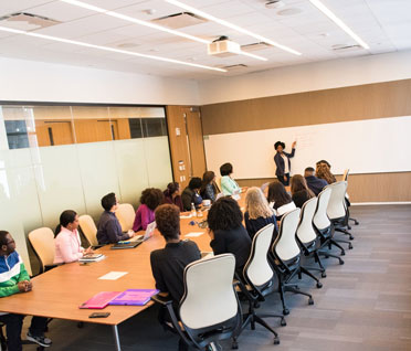 Audience attending a live Growth Summit session